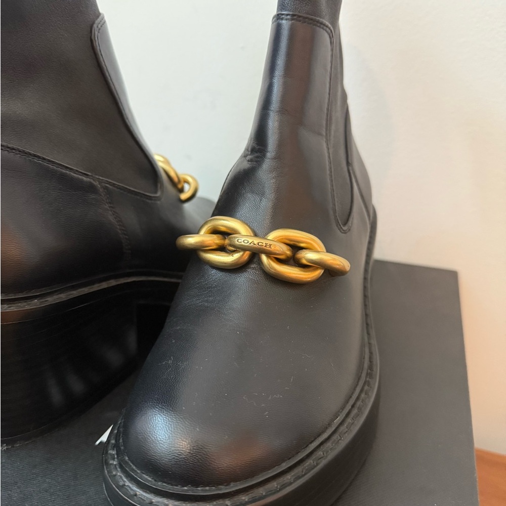 Coach Black Heeled Boots with Gold Accent